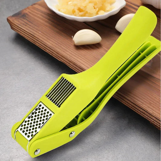 2-in-1 garlic press and slicer in bright green for easy home cooking and meal prep
