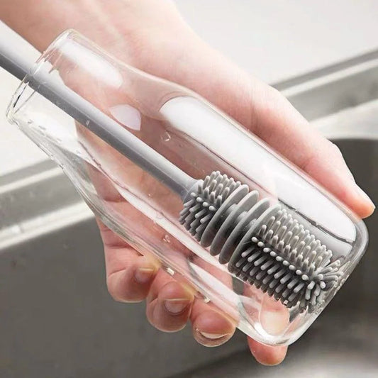 Silicone bottle brush with long handle for cleaning cups, glasses, and bottles, non-scratch bristles, durable kitchen cleaning tool.  
