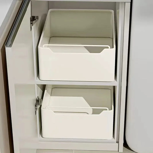 Pull-out kitchen storage rack with slide rails for cabinets and drawers, ideal for spices and utensils.
