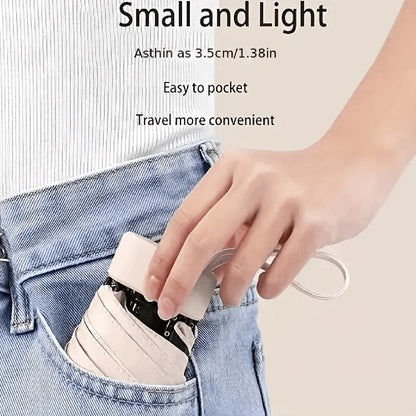 Portable ultra-light sixfold mini umbrella with UV-resistant canopy, foldable travel design for sun and rain protection
