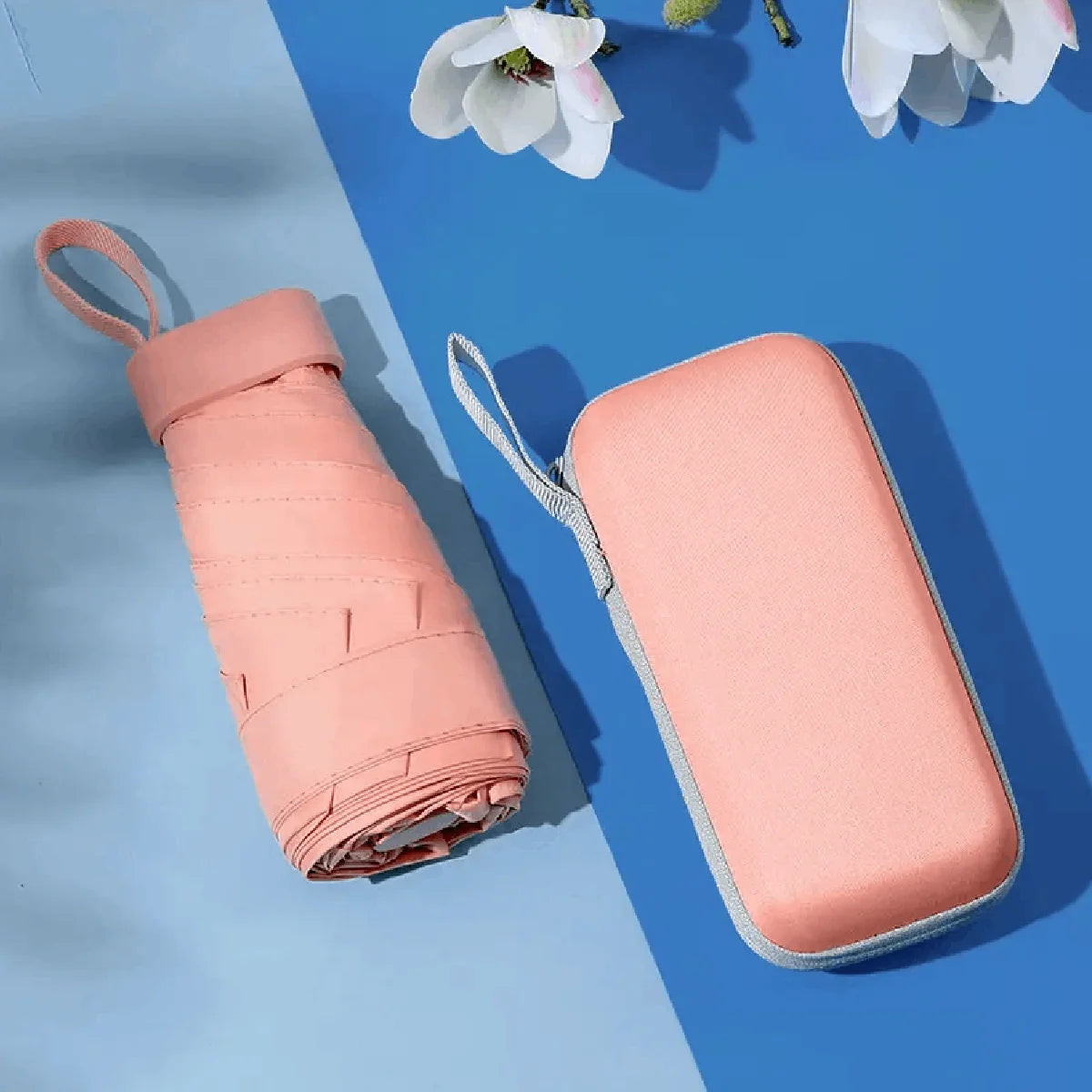 Portable ultra-light sixfold mini umbrella with UV-resistant canopy, foldable travel design for sun and rain protection
