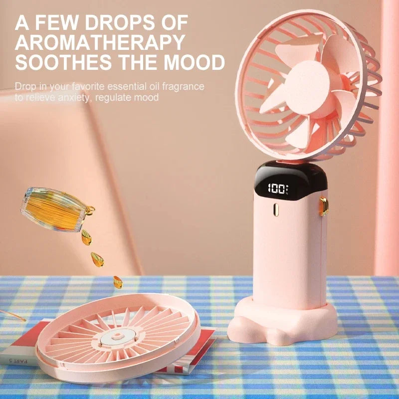 Foldable portable mini fan with neck hanging design, 5-speed USB rechargeable, phone stand and digital display.  
