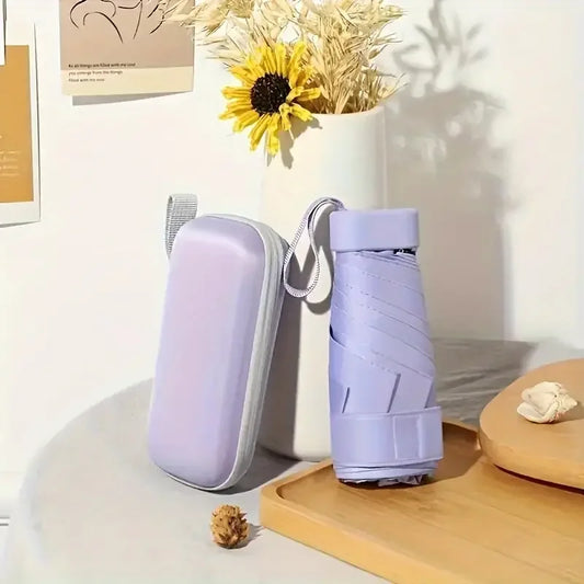 Portable ultra-light sixfold mini umbrella with UV-resistant canopy, foldable travel design for sun and rain protection
