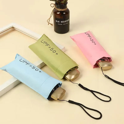 Compact foldable umbrella for sun and rain with UV protection, portable and stylish design
